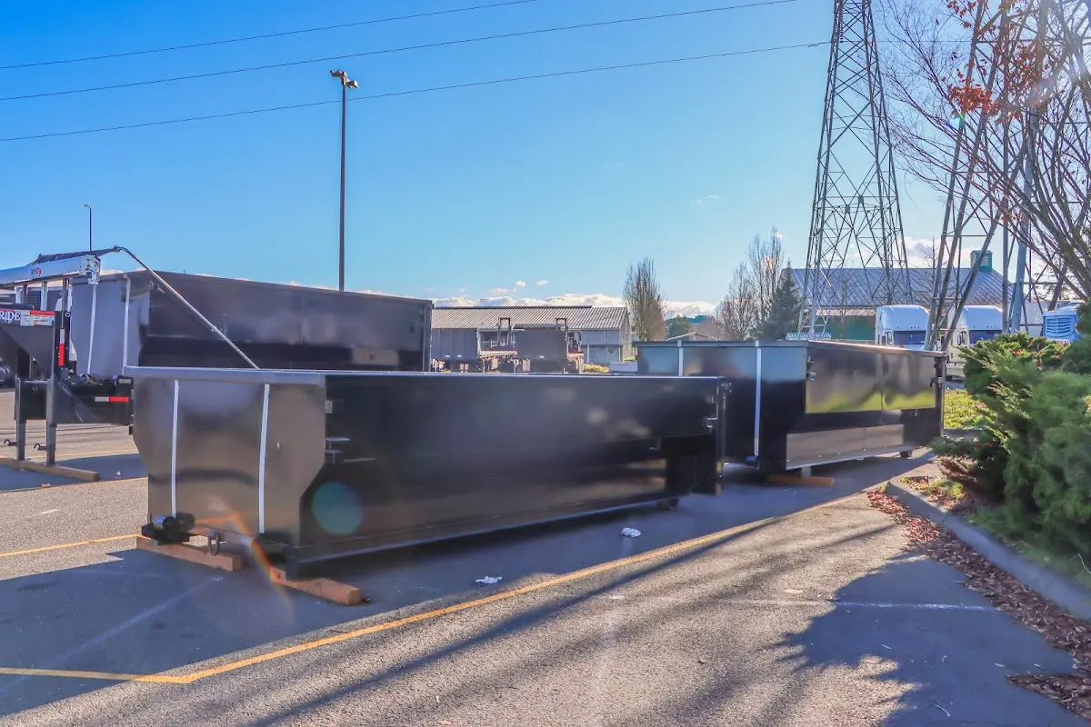 Roll-off dumpster ready for waste disposal at job site for 12 Yard Dumpster Rental in Inkster